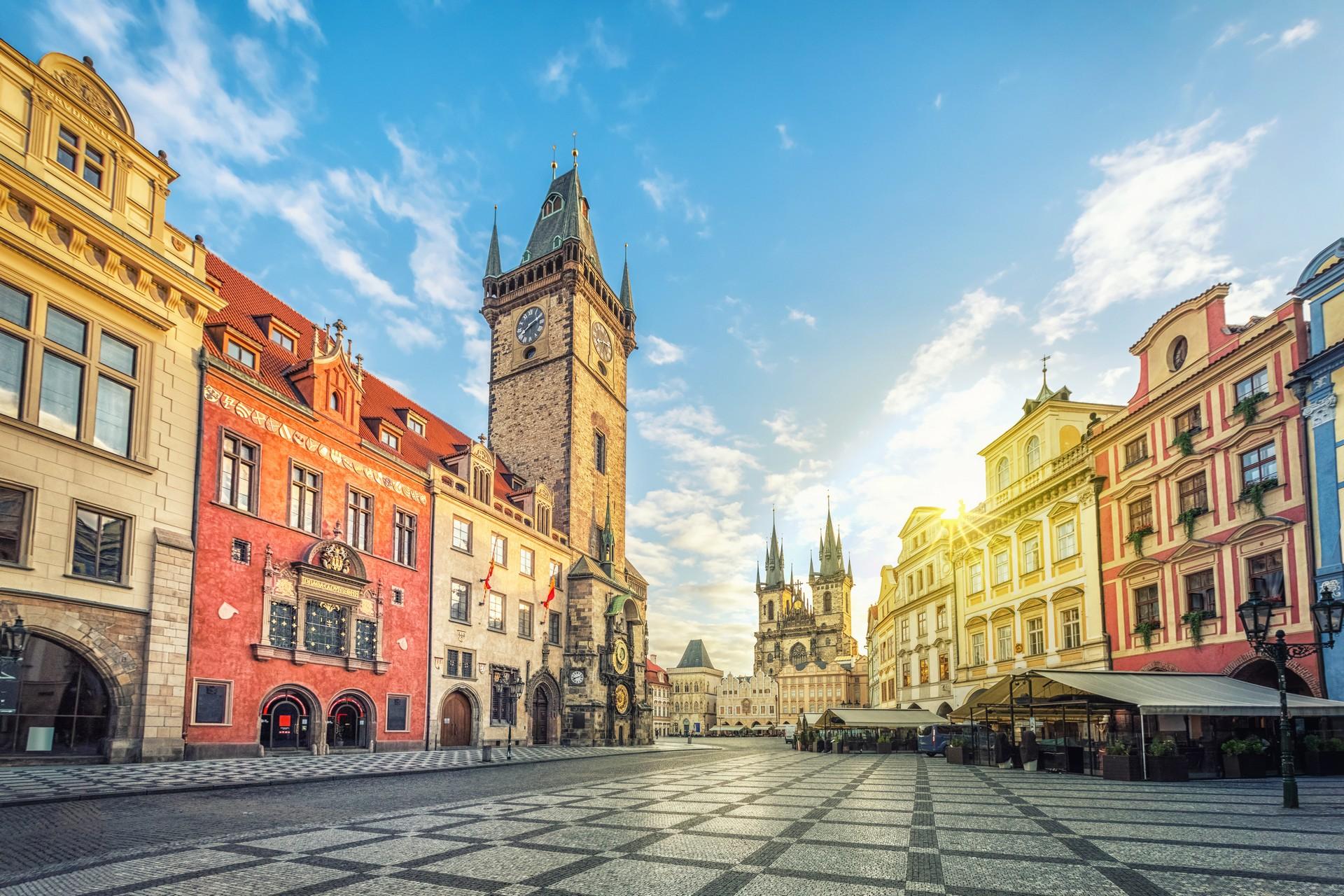 City square in Prague in sunny weather with few clouds