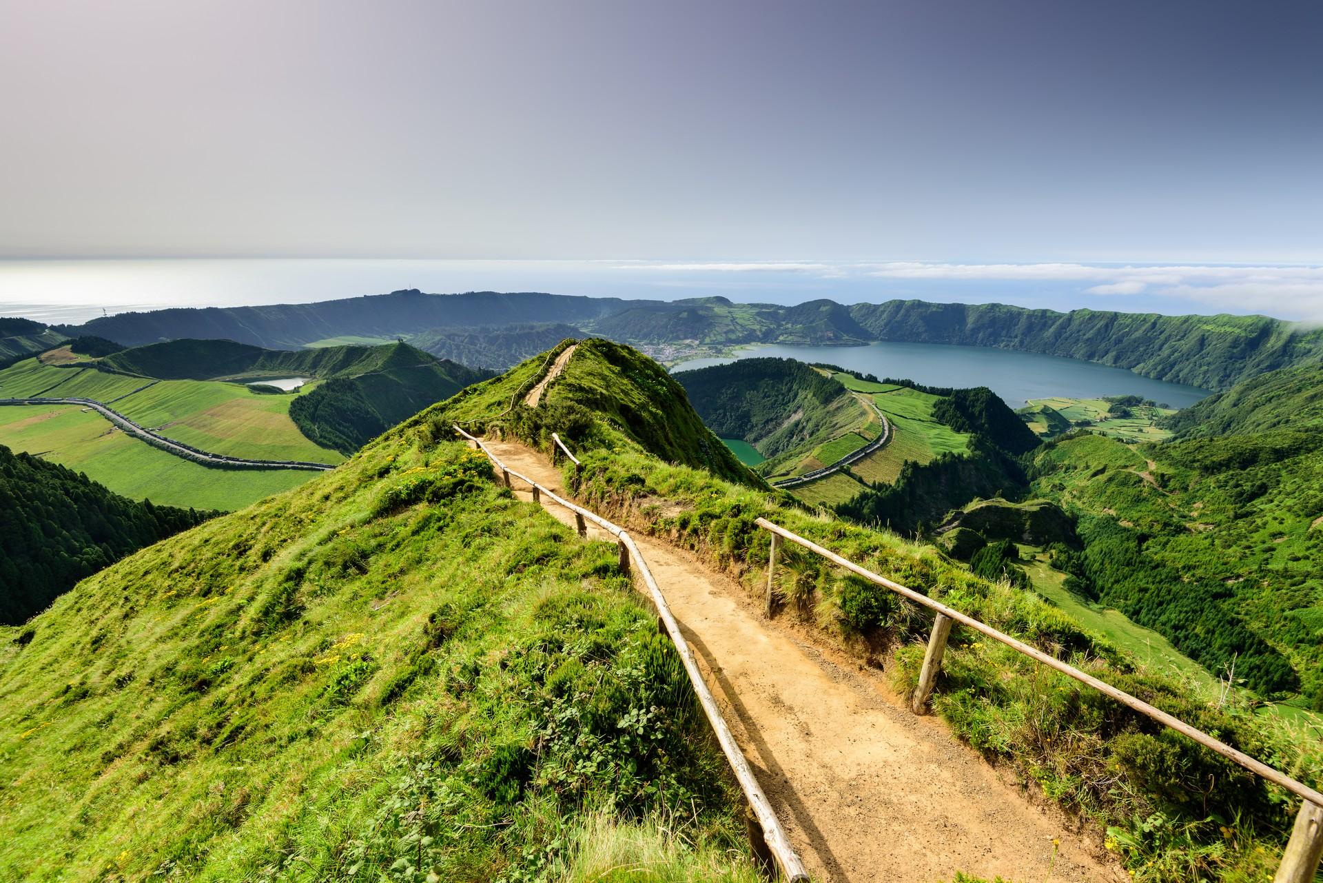 Azores: green hils and hiking trail. 