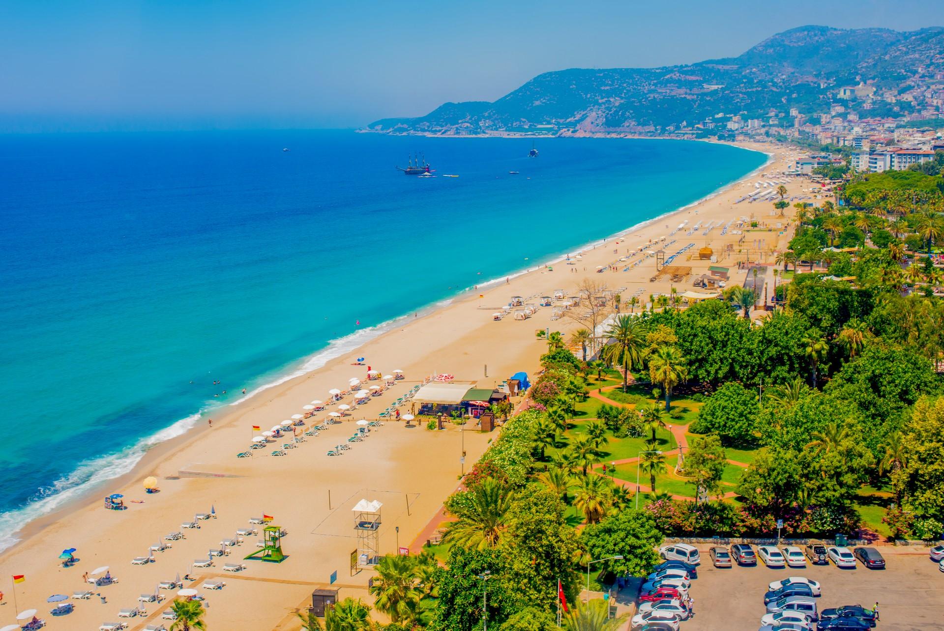 Aerial view of people on the beach in Alanya on a clear sky day