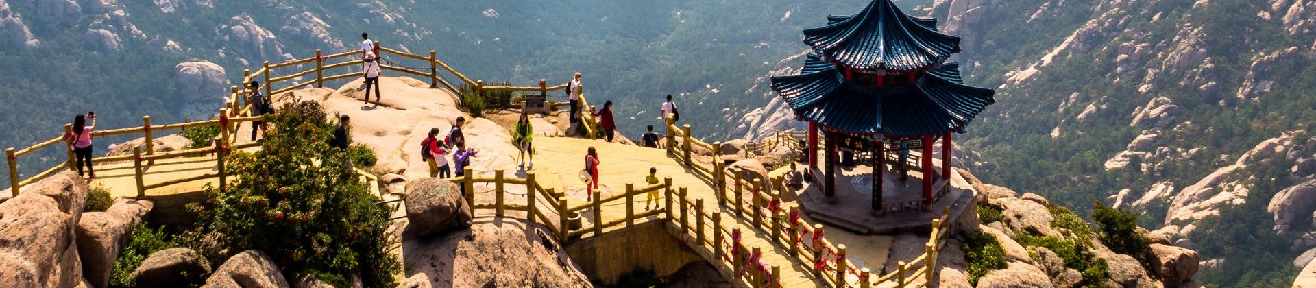 Aerial view of mountain range near Qingdao on a day with cloudy weather