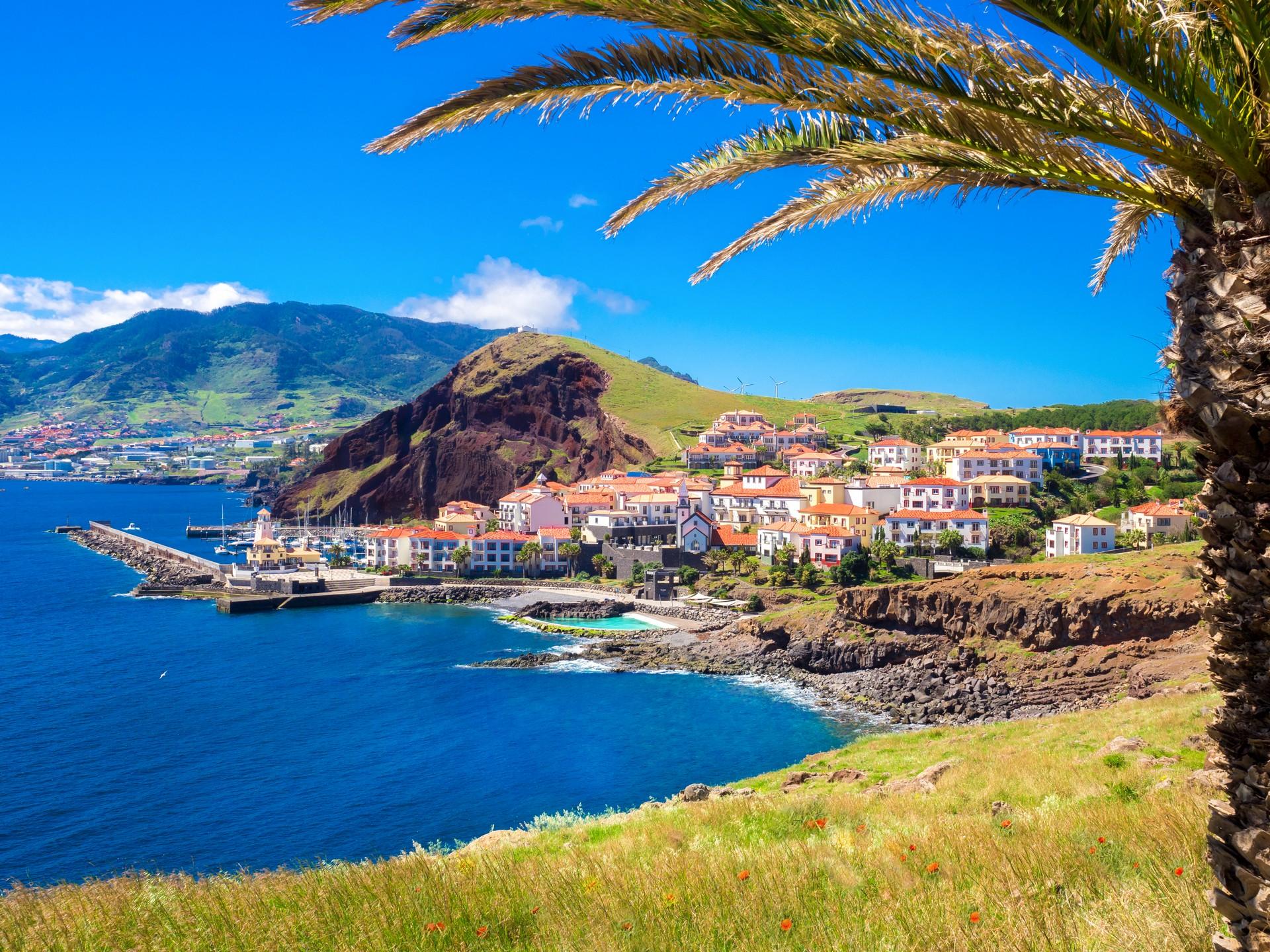 Beach in Madeira in sunny weather with few clouds