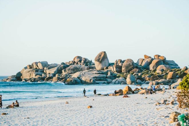 Beach and rock formations surrounded by sea in Cape Town