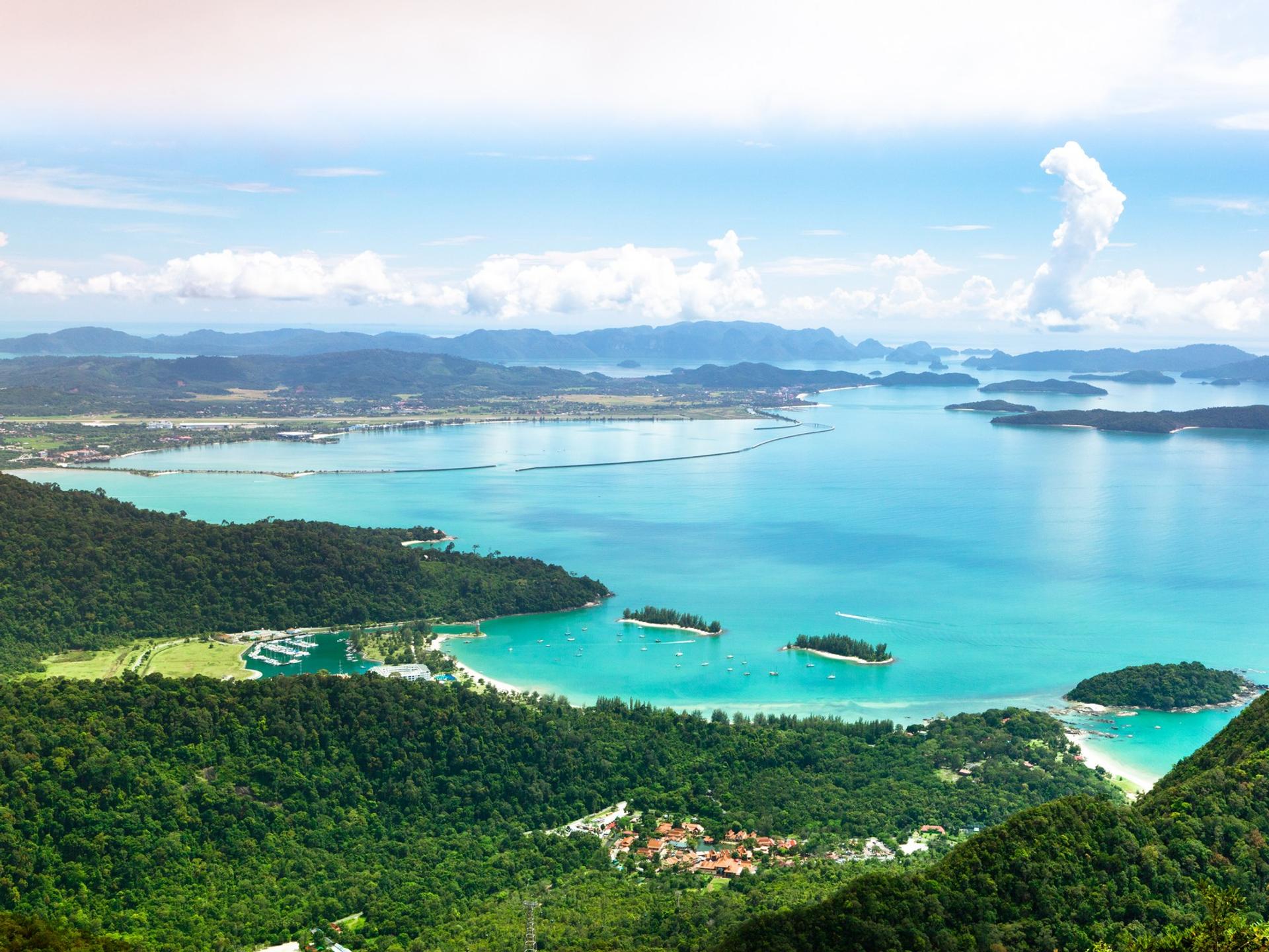 Beach with turquise sea in Langkawi on a day with cloudy weather