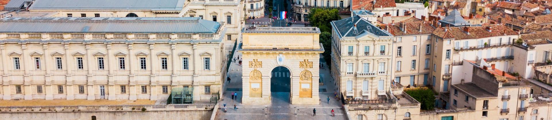 Aerial view of city square in Montpellier in sunny weather with few clouds