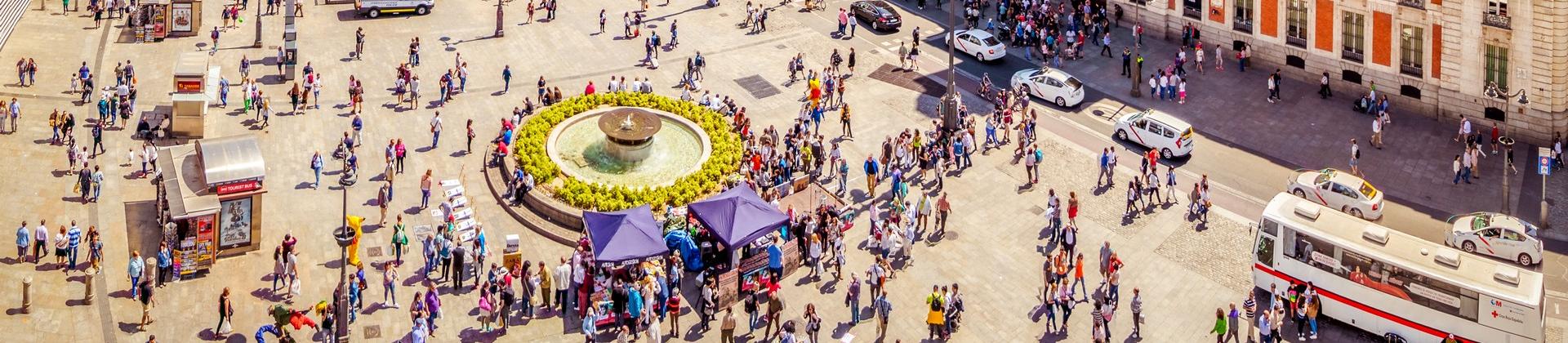 City square in Madrid with cloudy sky