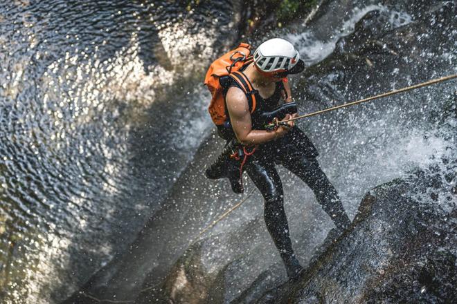 A person participating in canyoning in Corsica