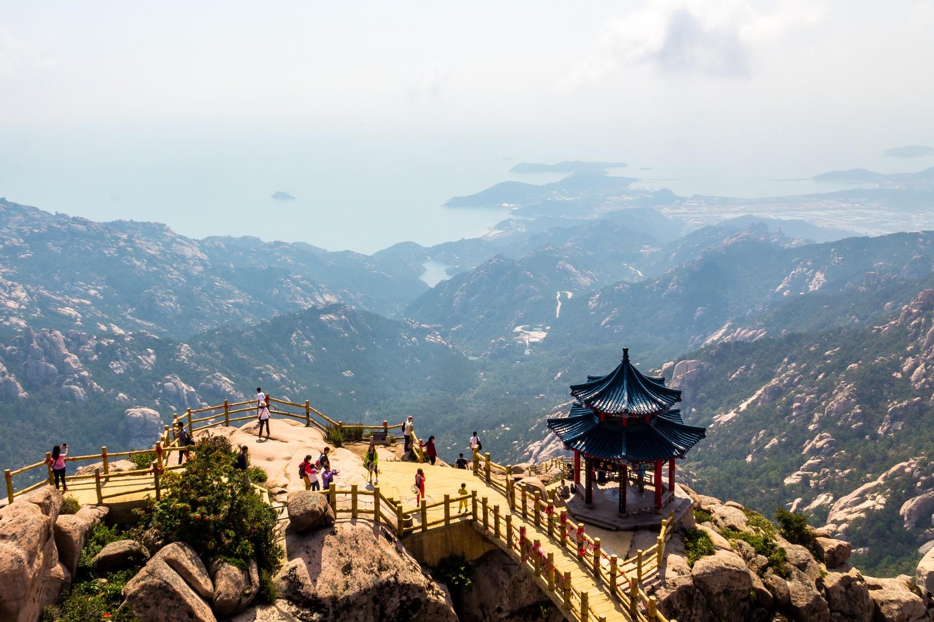 Aerial view of mountain range near Qingdao on a day with cloudy weather