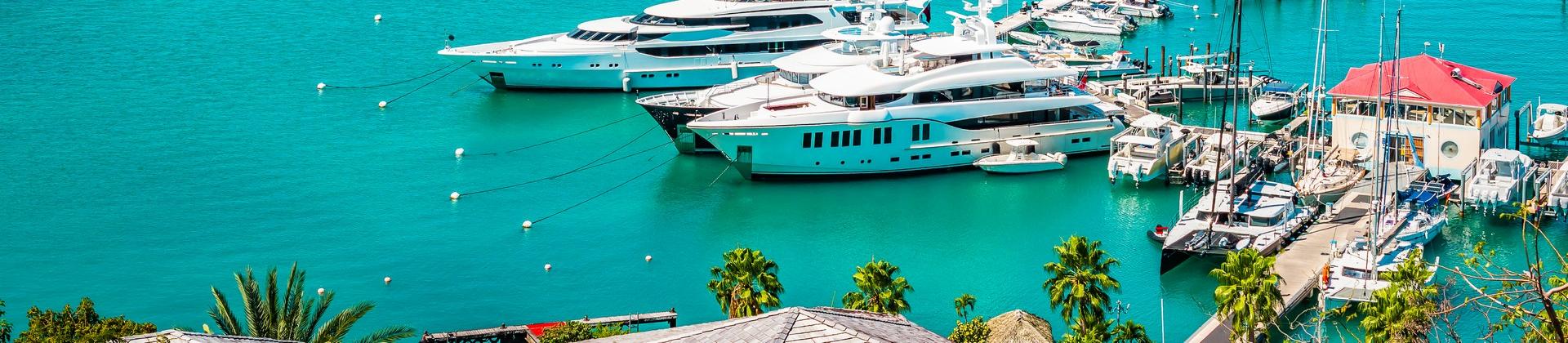 Boat in Marigot in sunny weather with few clouds