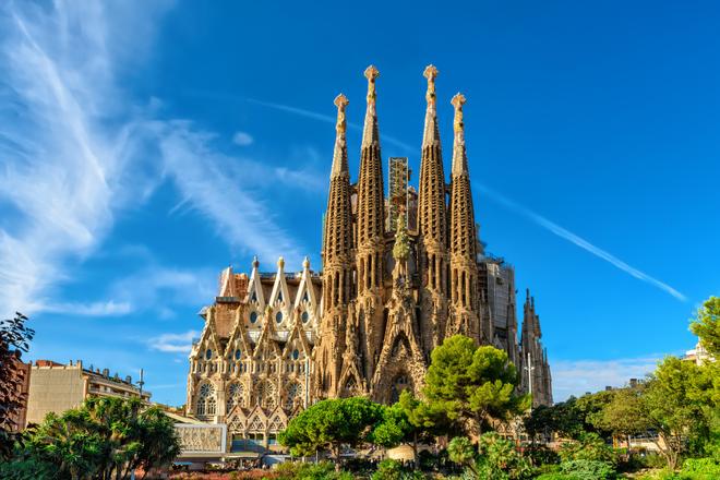 Gaudí's Sagrada Família temple in Barcelona under clear skies.