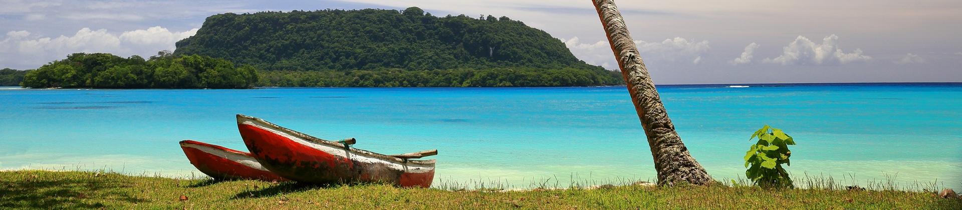 Boat near Luganville in sunny weather with few clouds