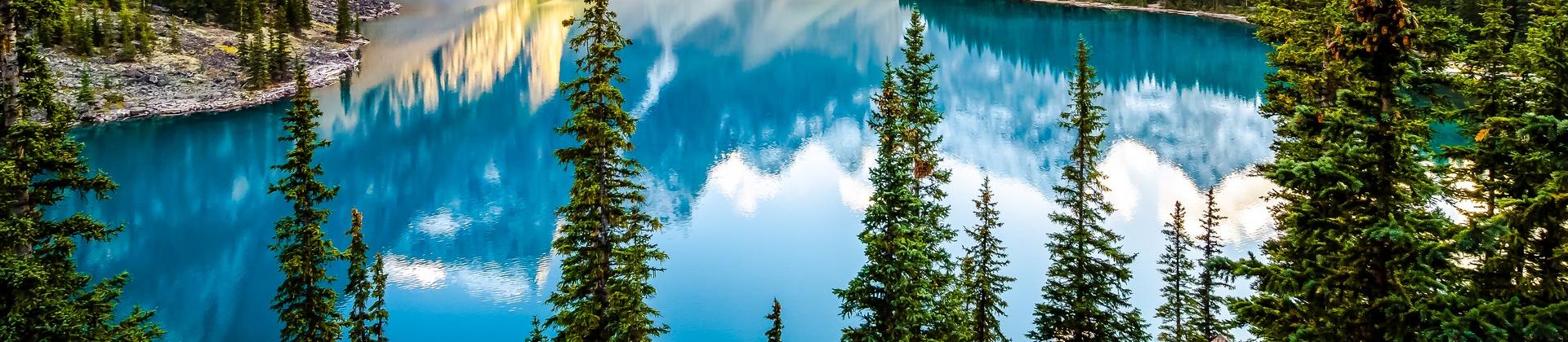 Mountain range near Banff in partly cloudy weather