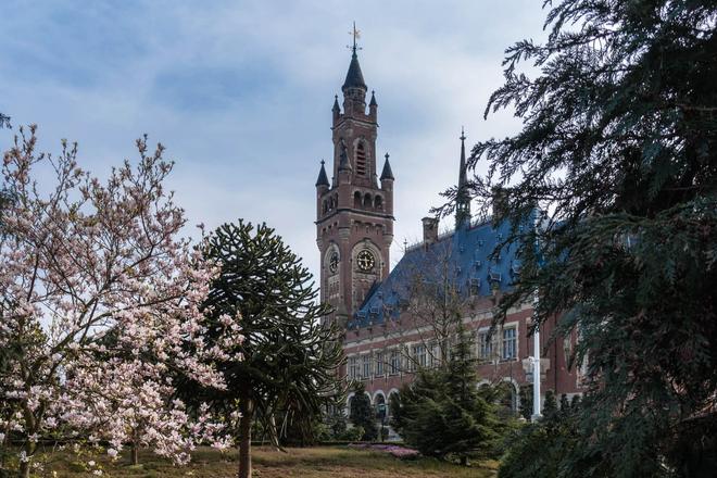 View of the Peace Palace surrounded by nature