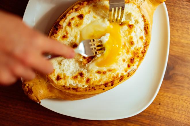 Traditional Georgian khachapuri ajaruli.