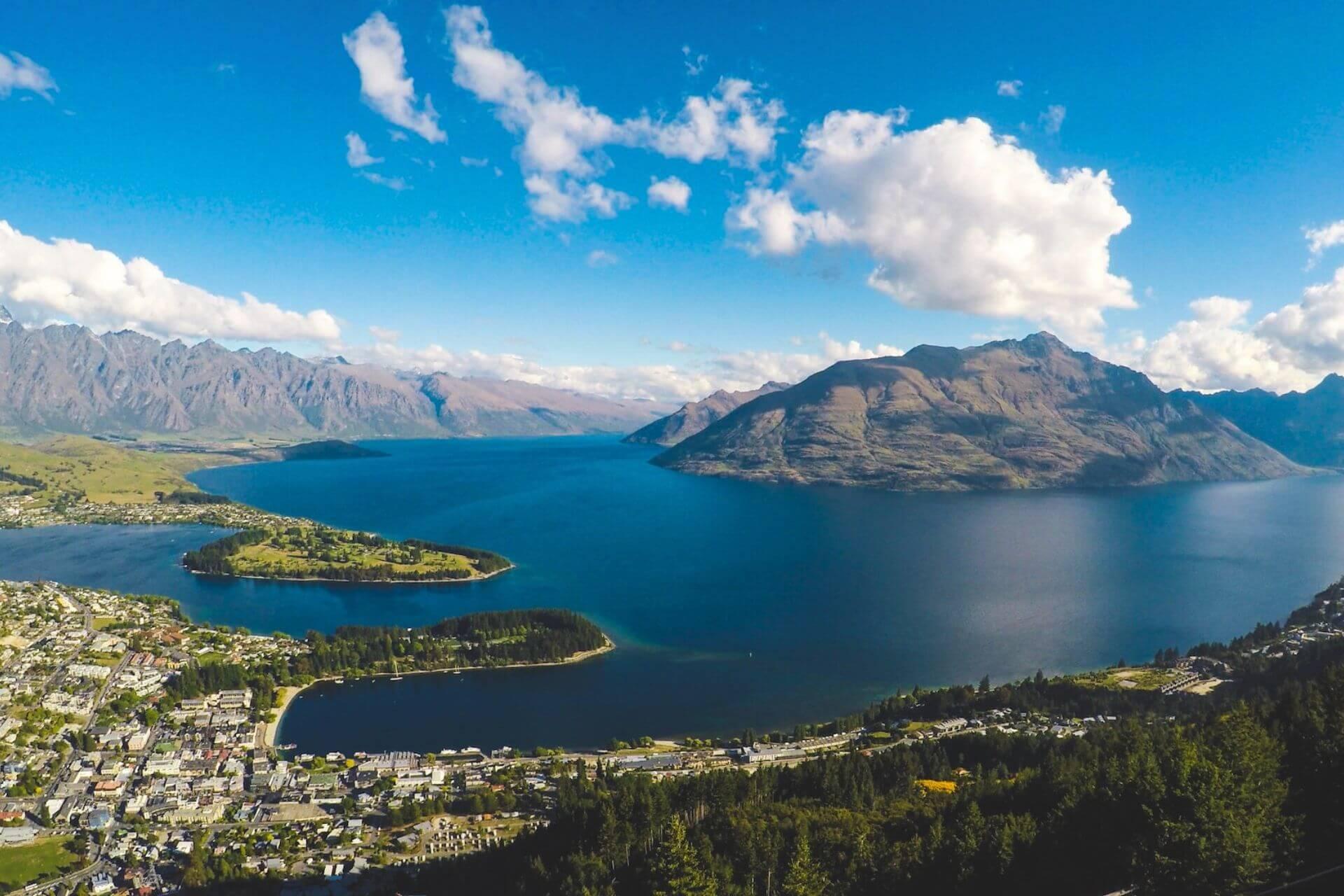 View of mountains, a city, and the sea in New Zealand