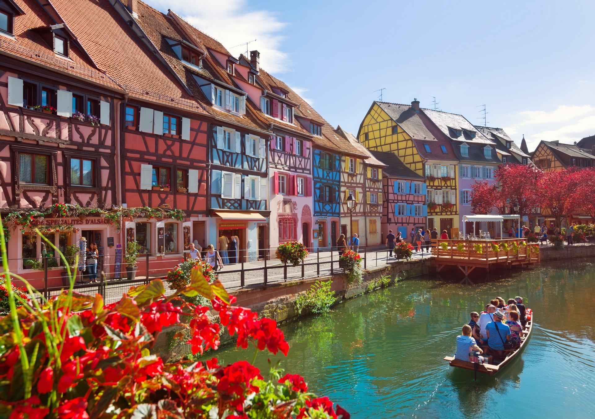 Boat in Colmar on a sunny day with some clouds