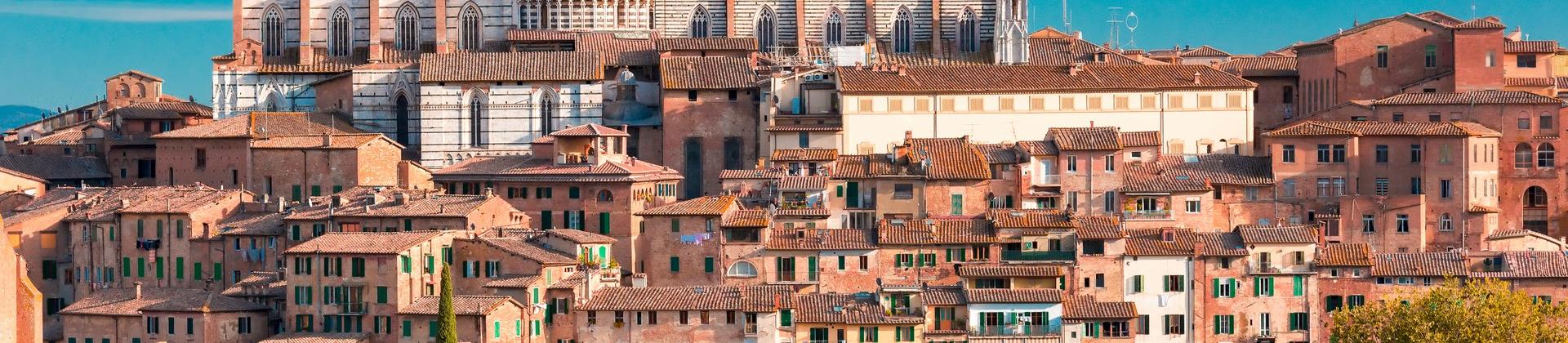 Architecture in Siena on a sunny day with some clouds