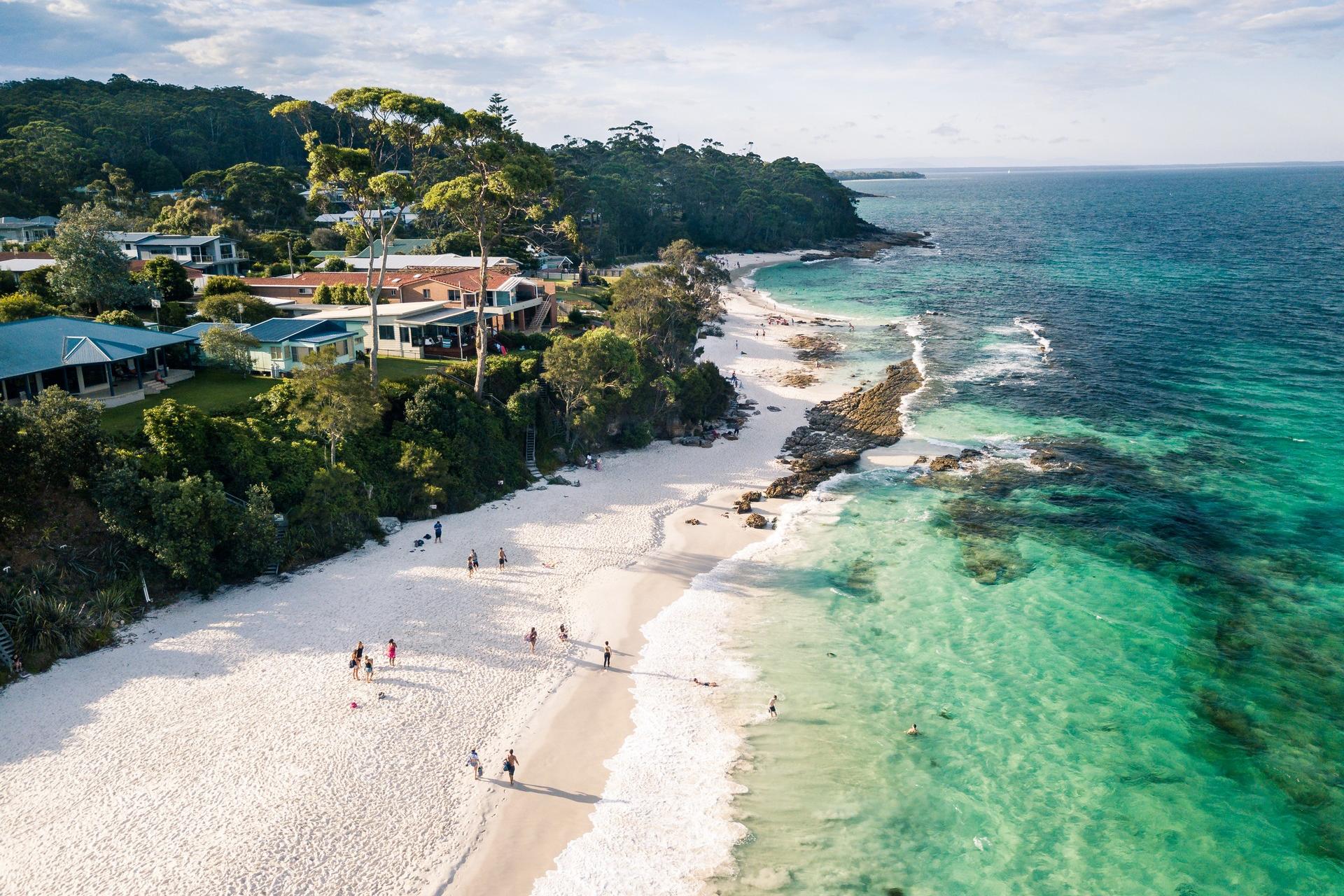 Aerial view of nice beach in Hyams Beach on a day with cloudy weather