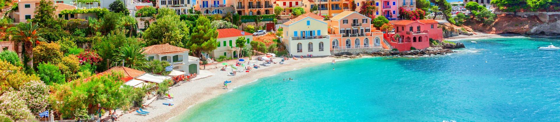 Beach with turquise water in Kefalonia on a sunny day with some clouds