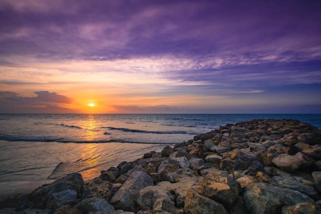 View of the rock beach, sea and sunset on Guajira peninsula, Colombia