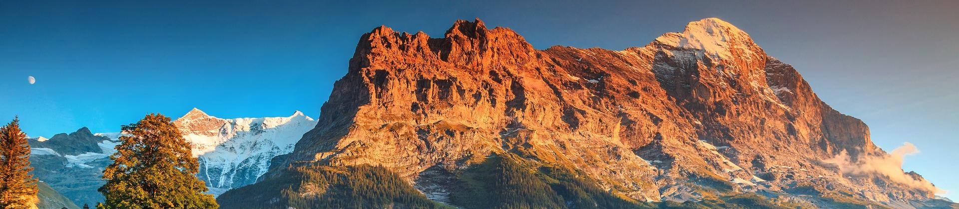 Countryside in Switzerland at sunset time