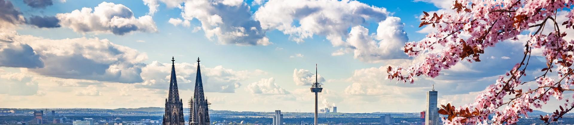 Architecture in Cologne in sunny weather with few clouds