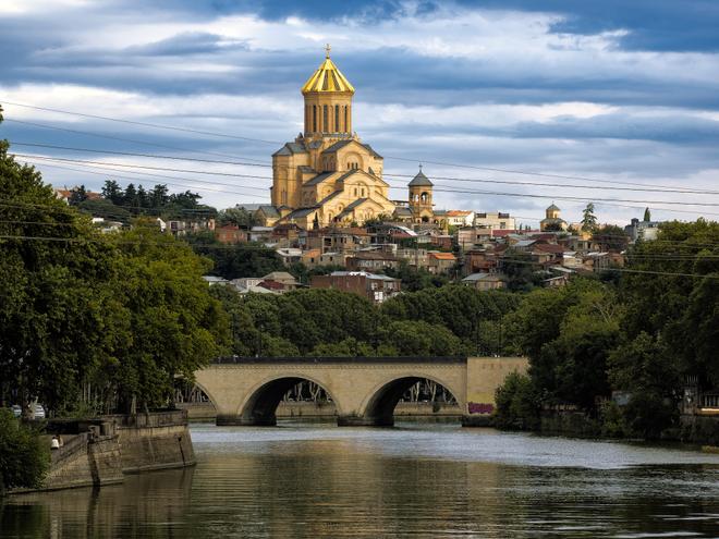 The Holy Trinity Cathedral of Tbilisi above The Kura River.