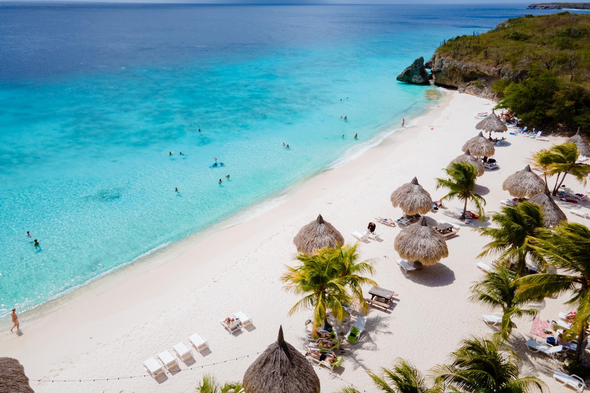 Awesome beach with turquise sea near Willemstad on a cloudy day