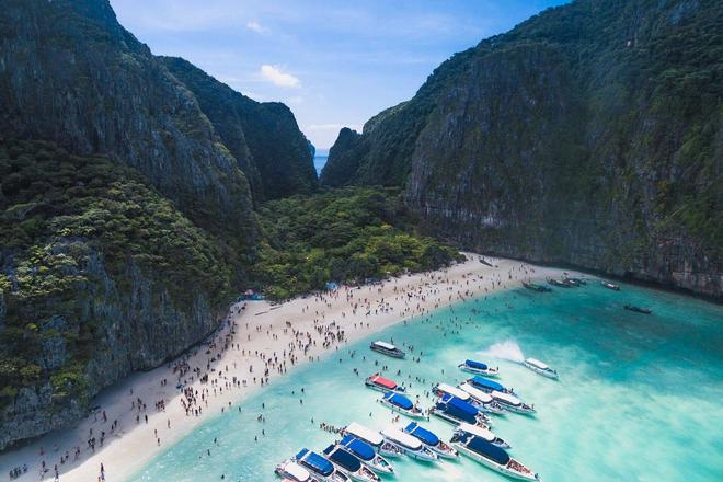 View of the mountains, beach, sea and people in Koh Phi Phi