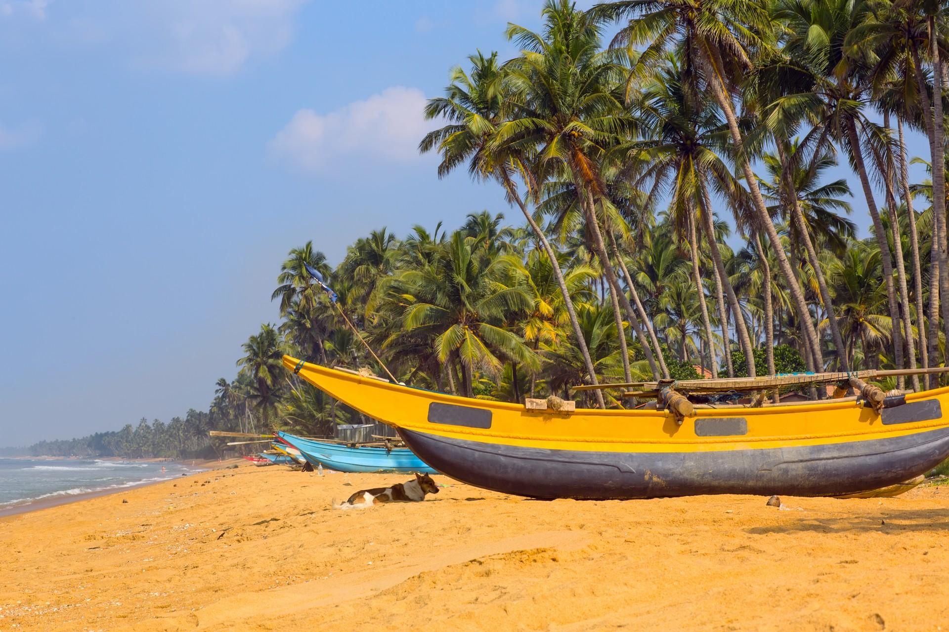 Amazing beach and boat in Meda Wadduwa on a sunny day with some clouds