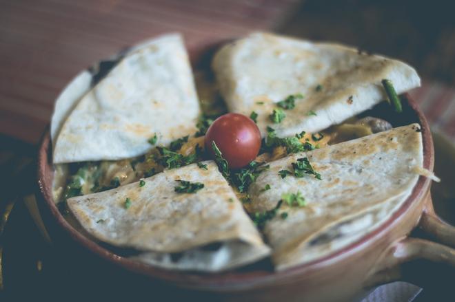 Mexican quesadilla: a tortilla filled with cheese, salami, jalapeños and a mixture of spices.