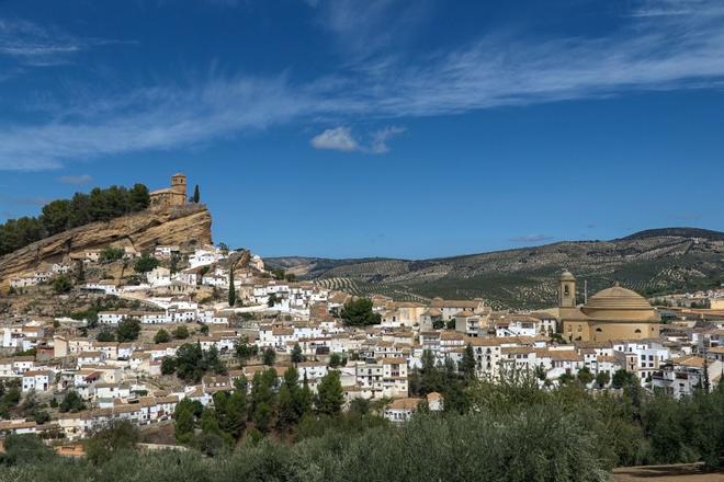 A city surrounded by forests and mountains in Granada, Spain