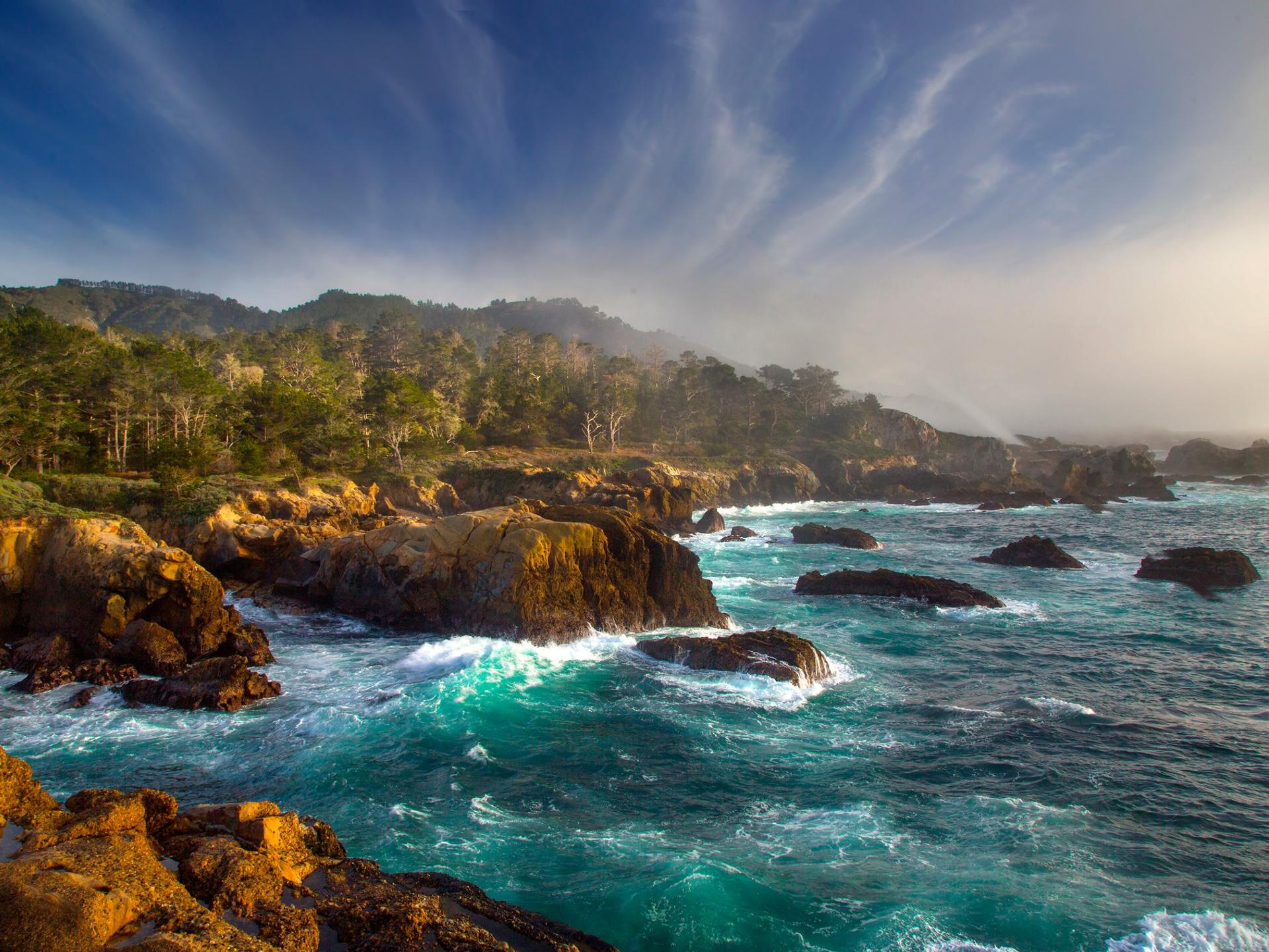 Location near Carmel-by-the-Sea on a sunny day with some clouds