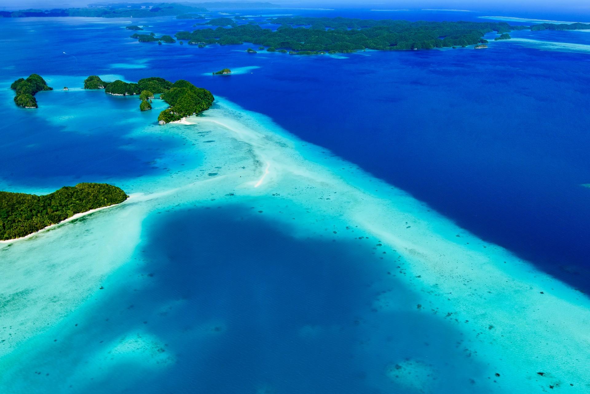 Aerial view of beach with turquise water in Koror