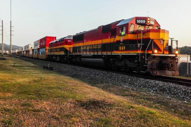 View of a red and yellow train in Panama