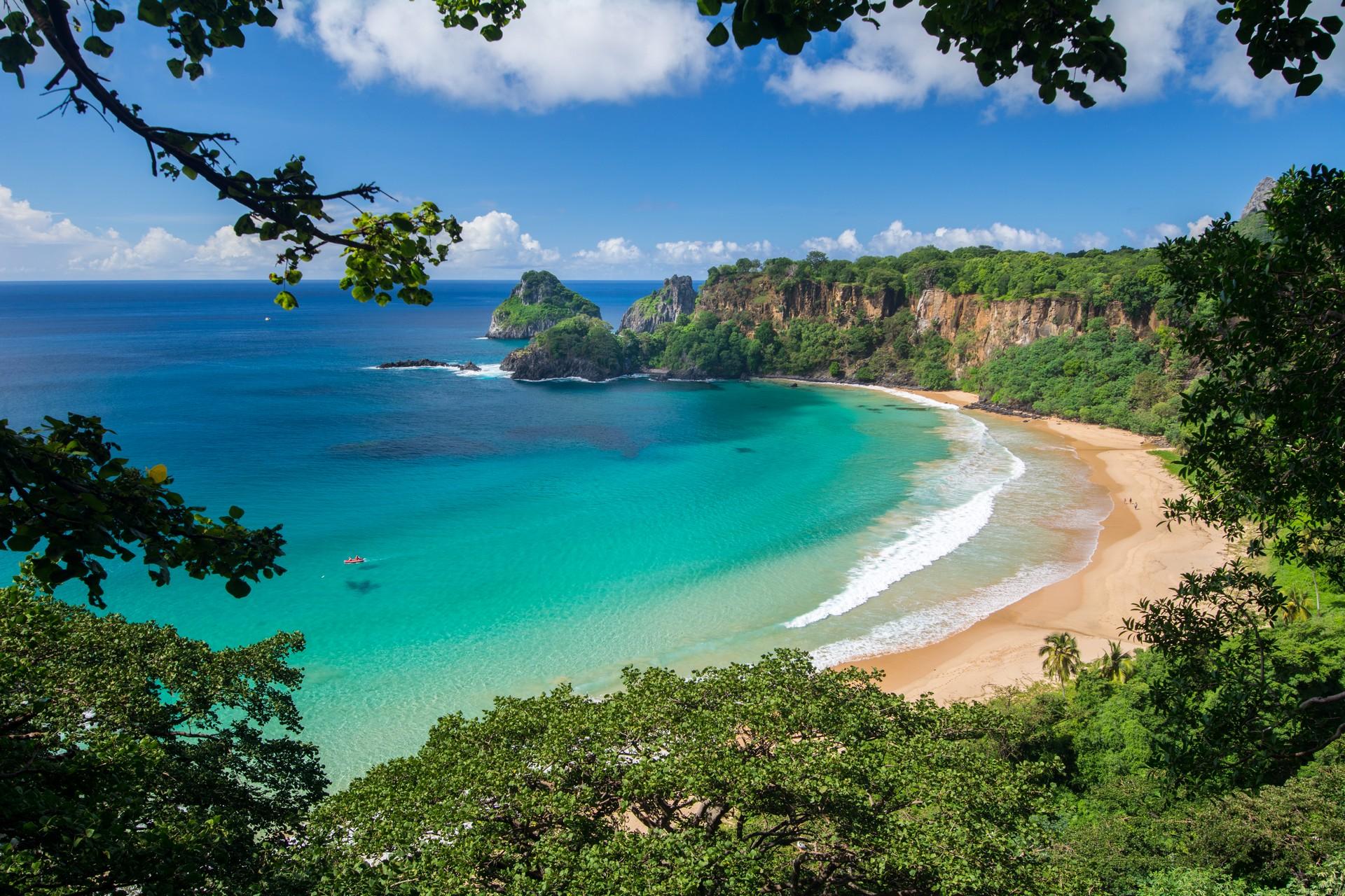 Beach in Fernando de Noronha on a sunny day with some clouds