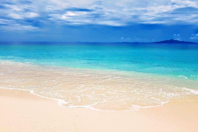 Beautiful white sand beach surrounded by sea