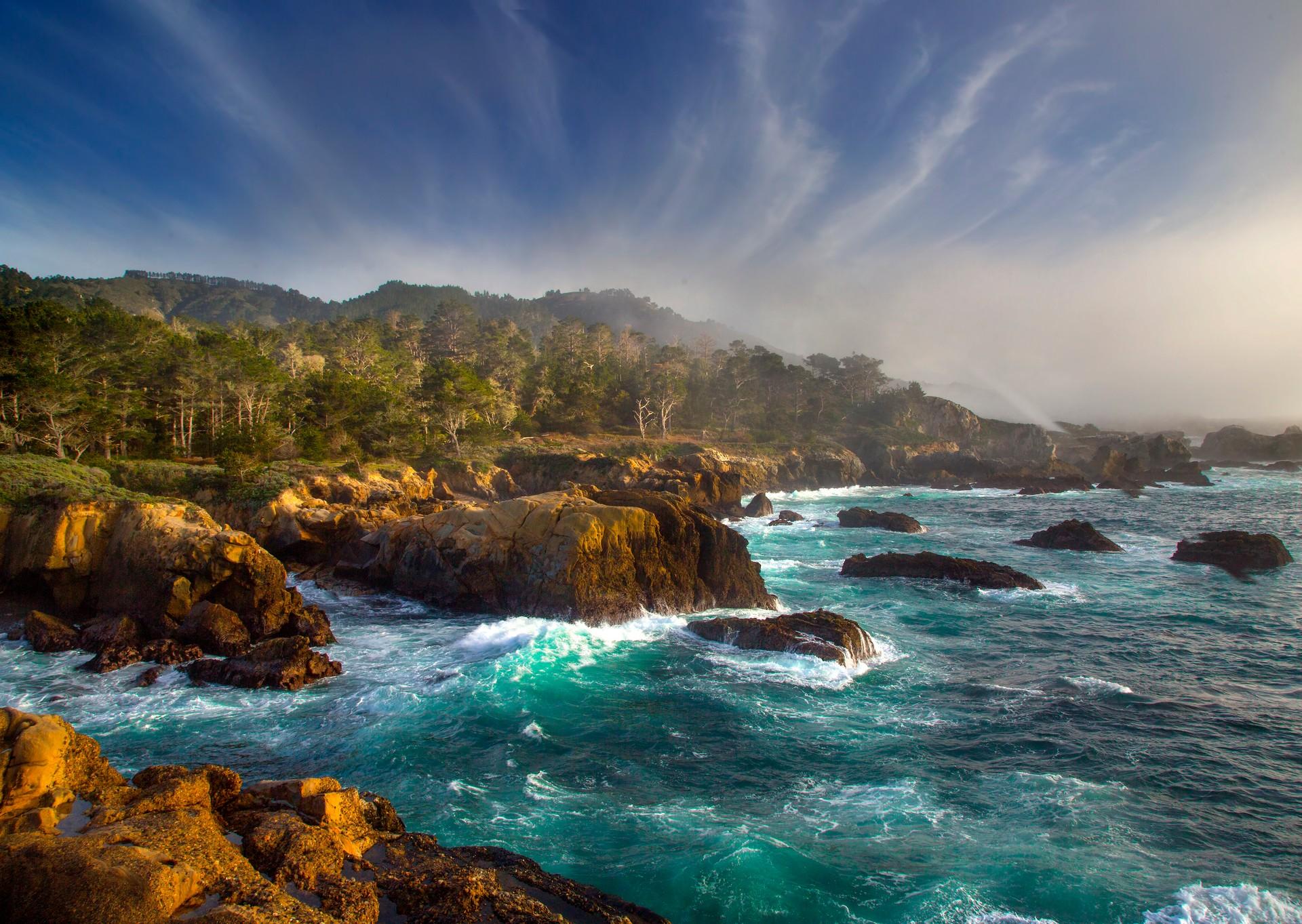 Location near Carmel-by-the-Sea on a sunny day with some clouds