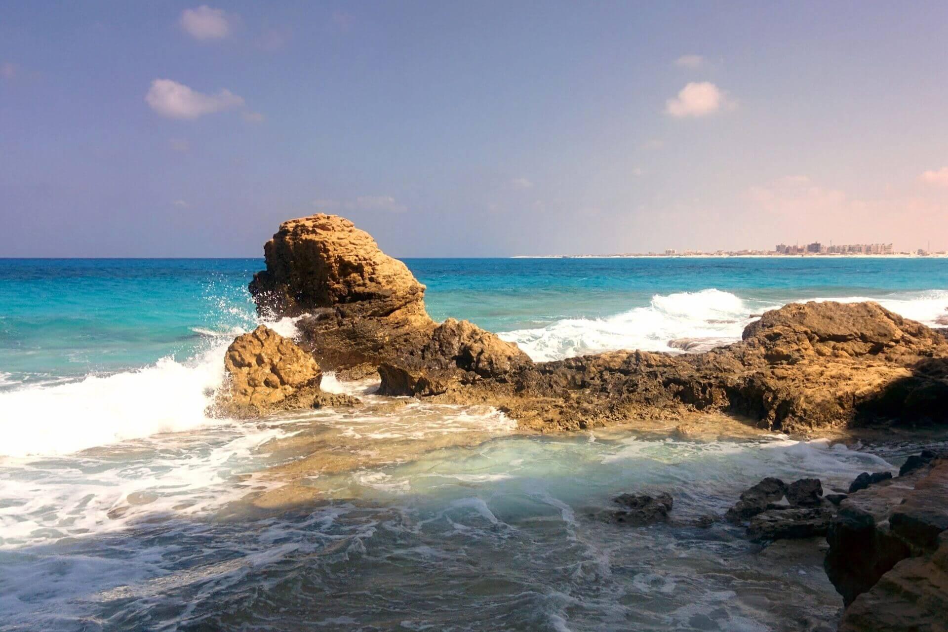 View of a rock formation in the sea at Marsa Matrouh, Egypt.