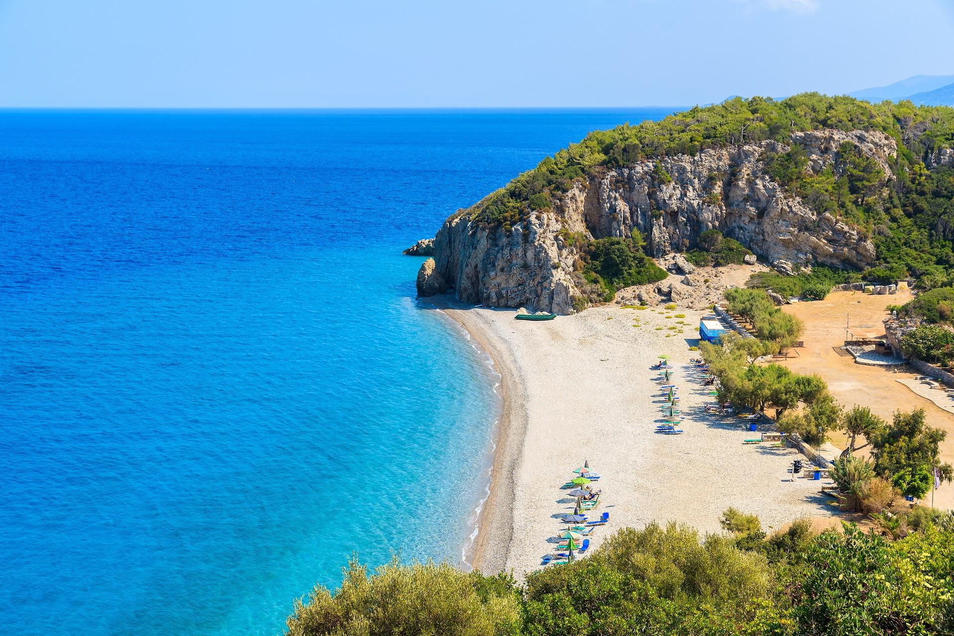 Nice beach by the sea in Samos on a clear sky day