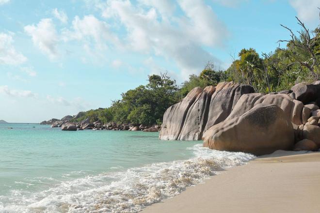 View of the Anse Lazio beach with huge rocks and sea
