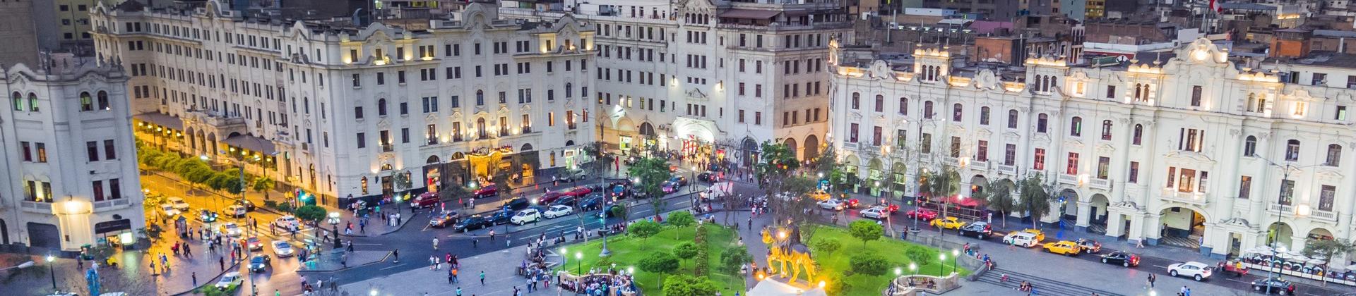 Aerial view of city square in Lima at sunset time