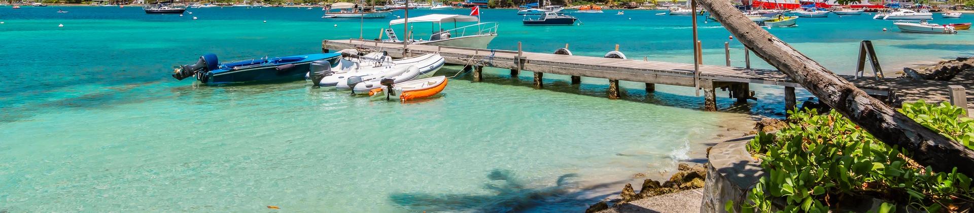 Amazing beach with turquise sea in Bequia Island with nice weather and blue sky