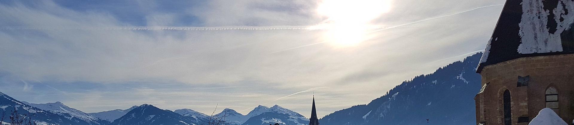 Aerial view of architecture in Kitzbühel on a day with cloudy weather