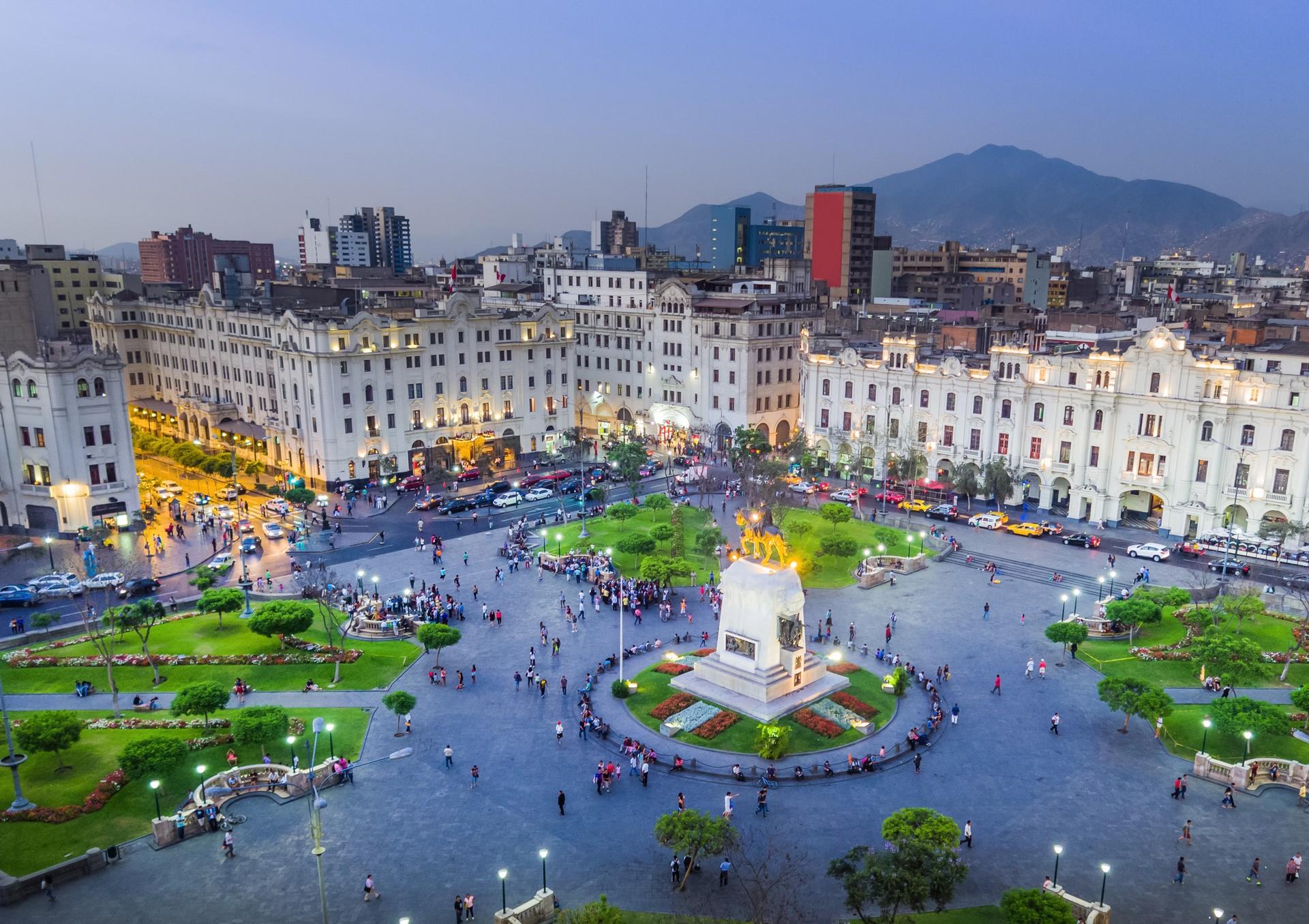 Aerial view of city square in Lima at sunset time