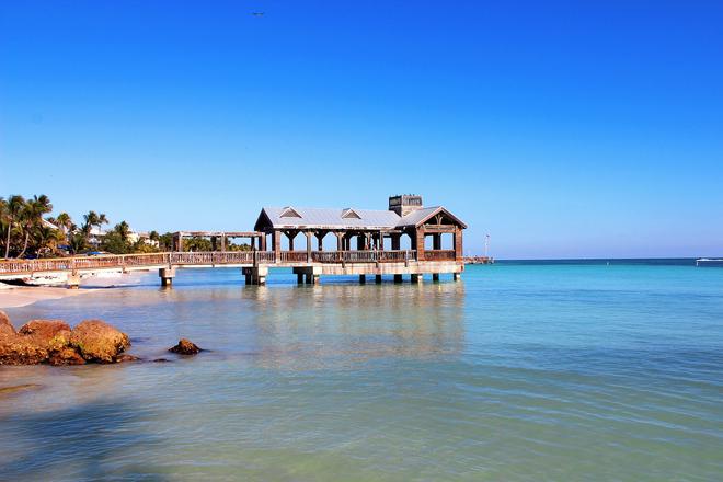 Florida, Key west: wooden gazebo on pillars on the sea.