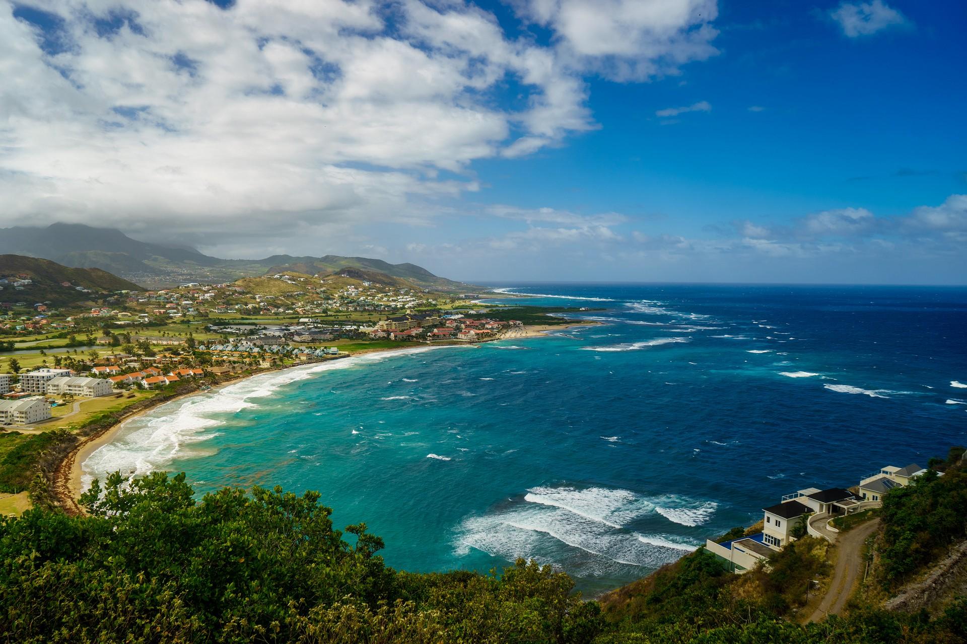 Aerial view of beach in Nevis on a sunny day with some clouds