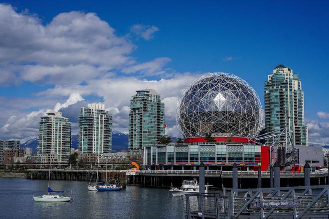 View of boats, city and the Science World in Vancouver