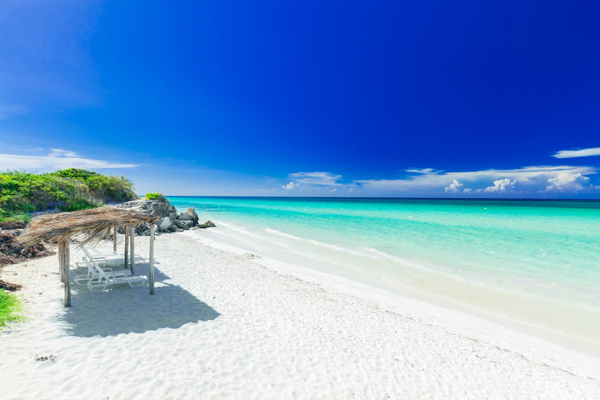 Amazing beach with turquise water in Cayo Coco in partly cloudy weather