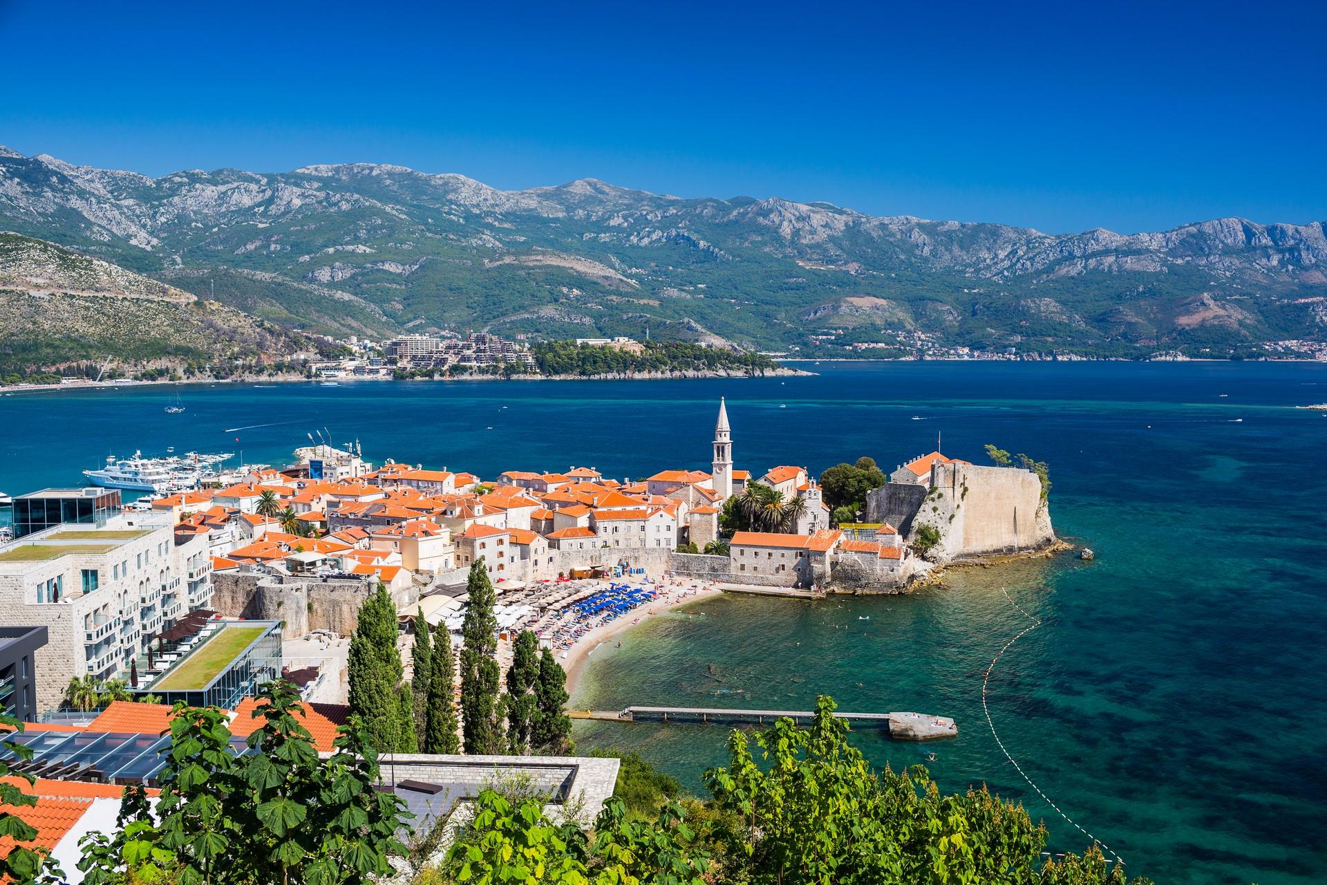 Aerial view of mountain range in Budva on a sunny day