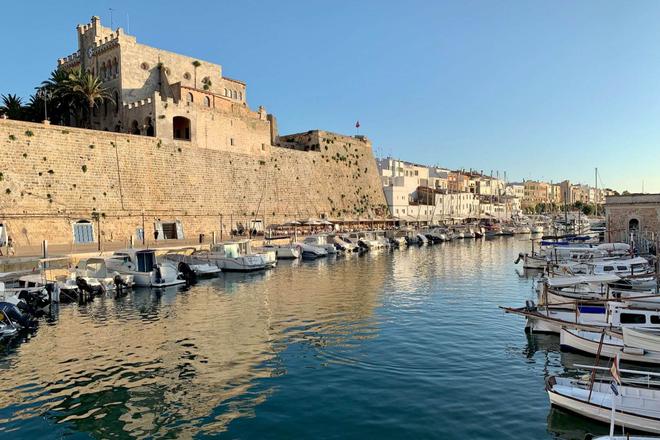 View of the Ciutadella city, sea and boats in Menorca